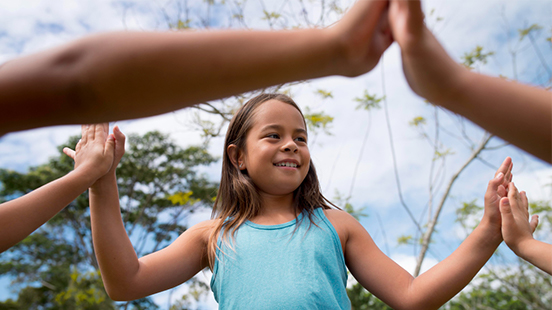 Children celebrating together outdoors